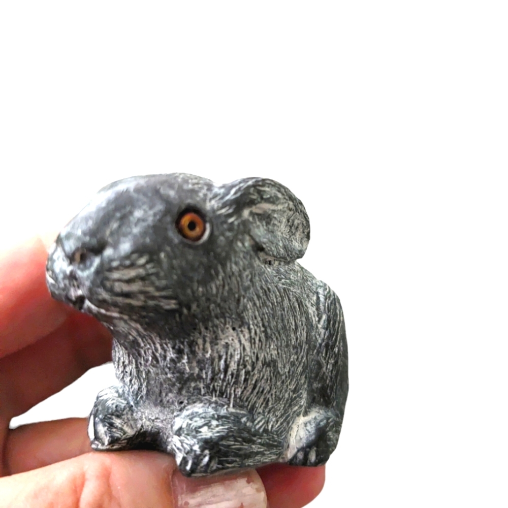 "Wolf" Vintage carving of a rabbit.  EUC . Authentic red eye. Signed w…